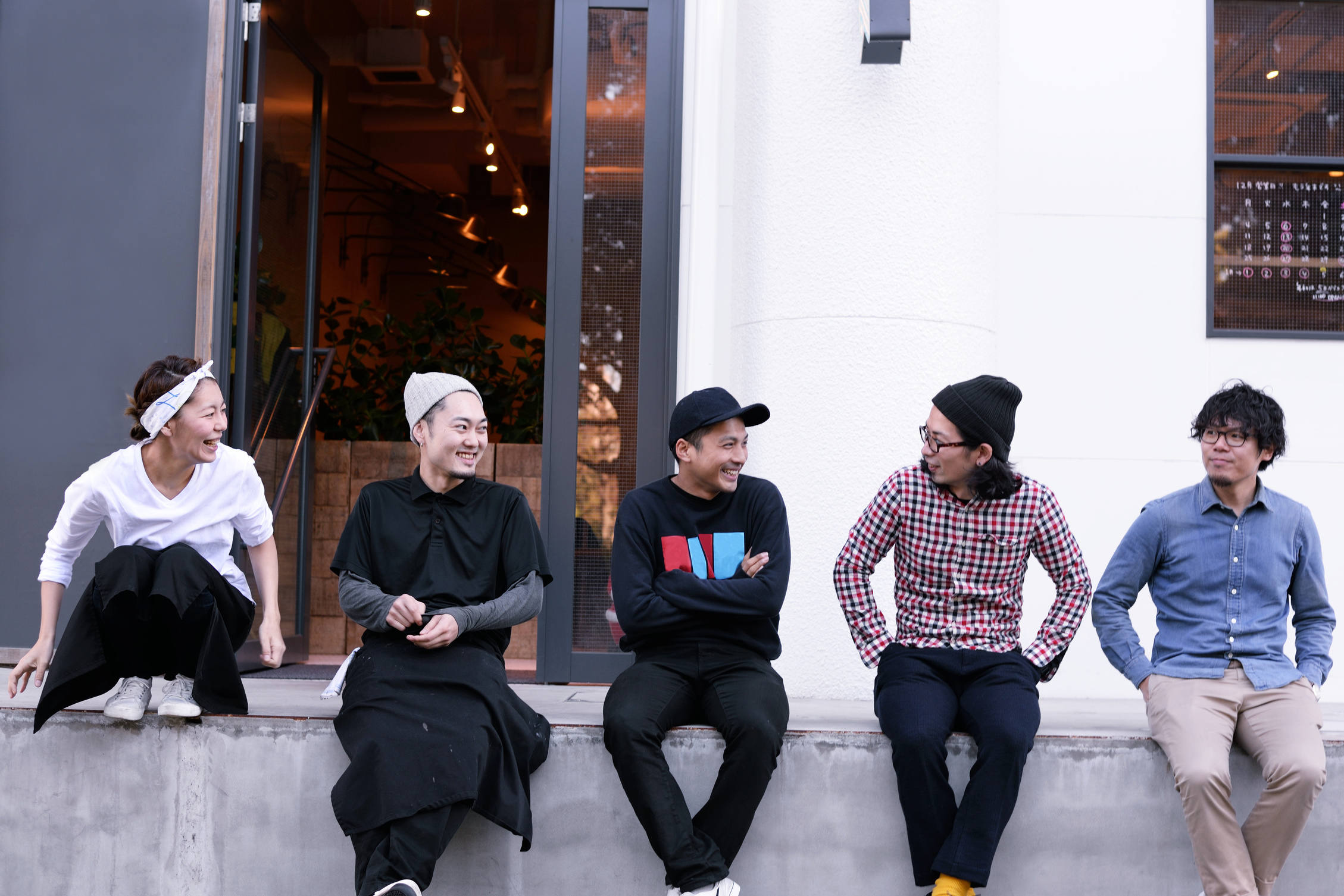 Cafe staff sitting outside